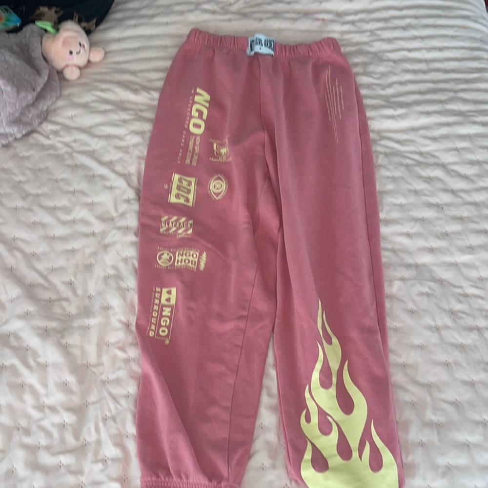 pink and yellow sweatpants